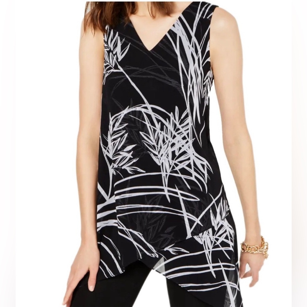 Alfani sleeveless v-neck with a multi layered handkerchief, hem style top.
